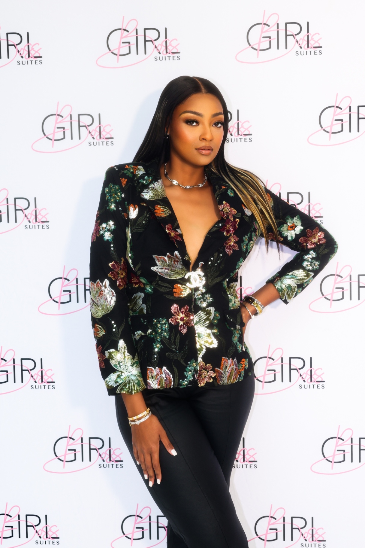 Portrait on the Girl Boss Suites media wall