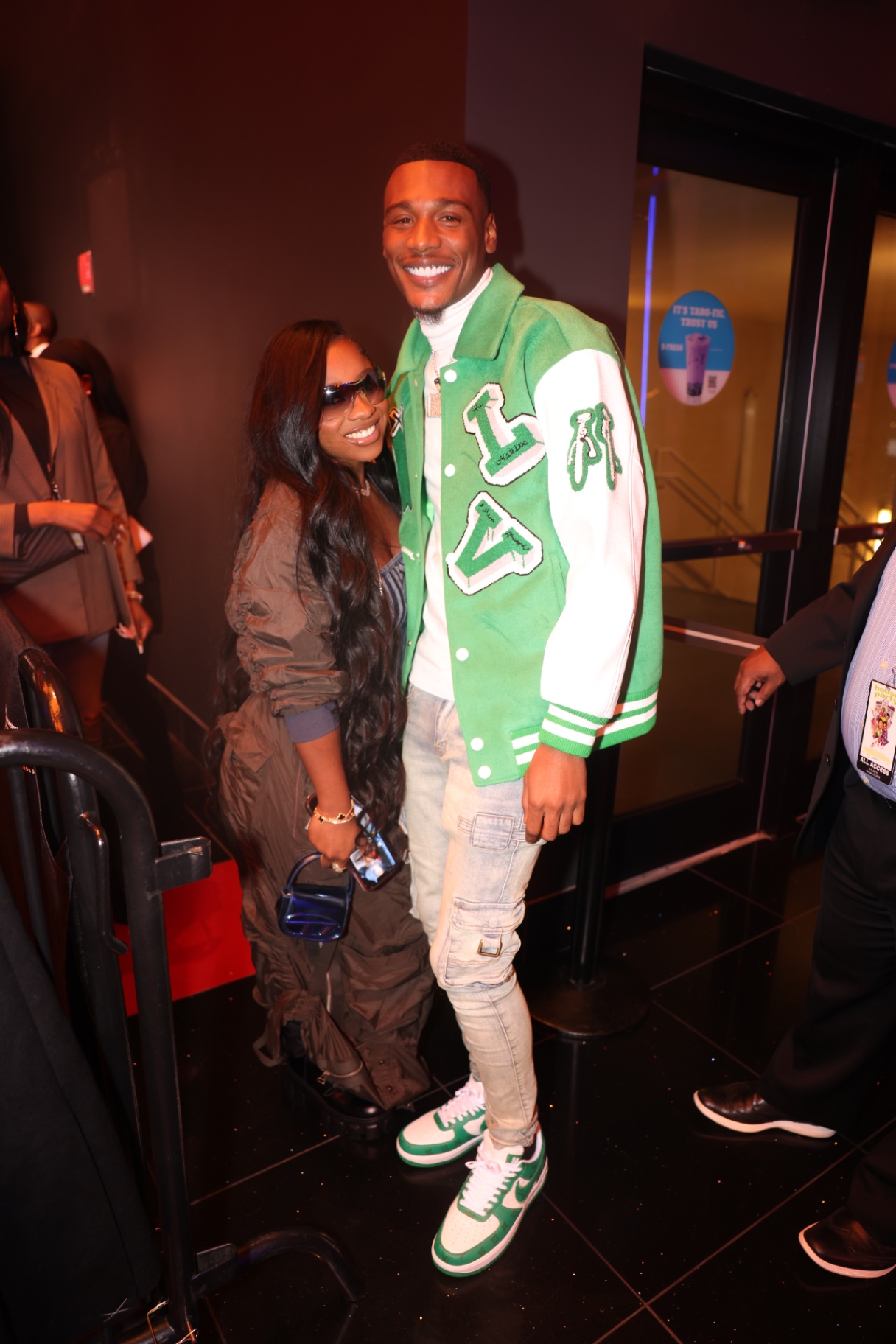 Couple posing at a movie premiere